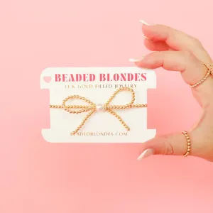 Gold Bow Bracelet: Standard 6.75 inch