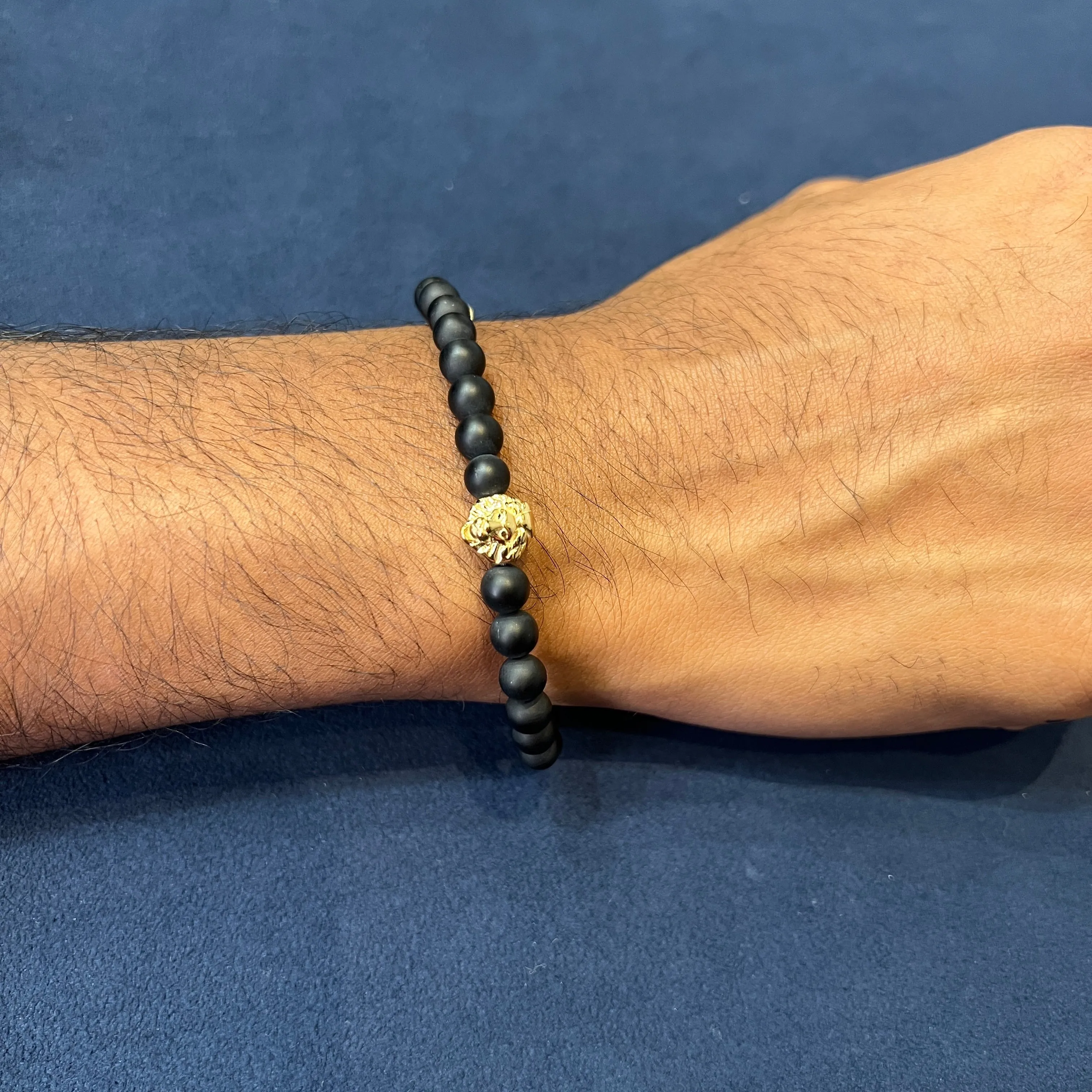 Italgem Stainless Steel Gold Plated Lion Heads and Matte Black Onyx Beaded Stretch Bracelet