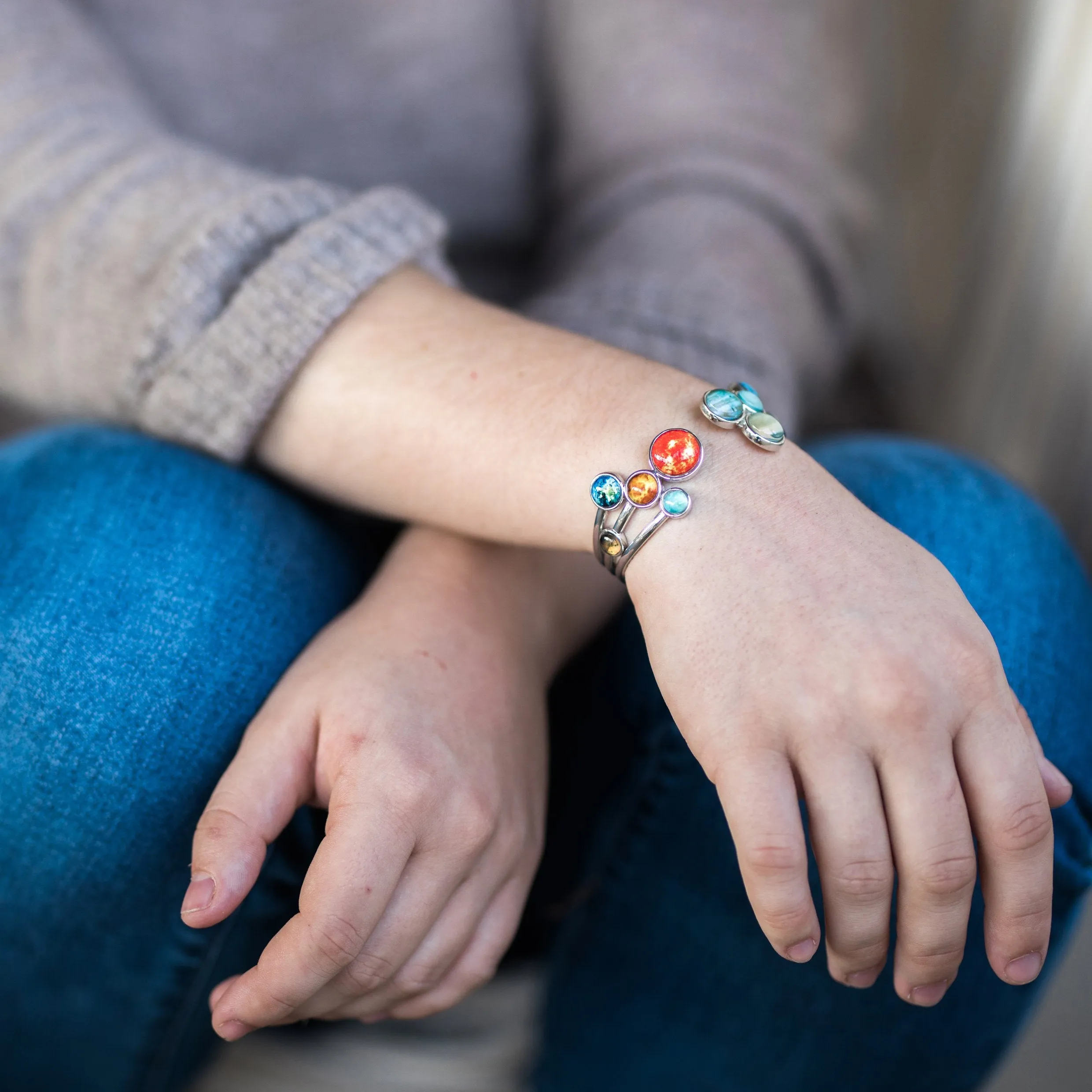 Solar System Adjustable Cuff Bracelet - Rhodium Plated Brass & Glass Materials, Handcrafted, 9 Planets & Sun Design, Care Instructions Included