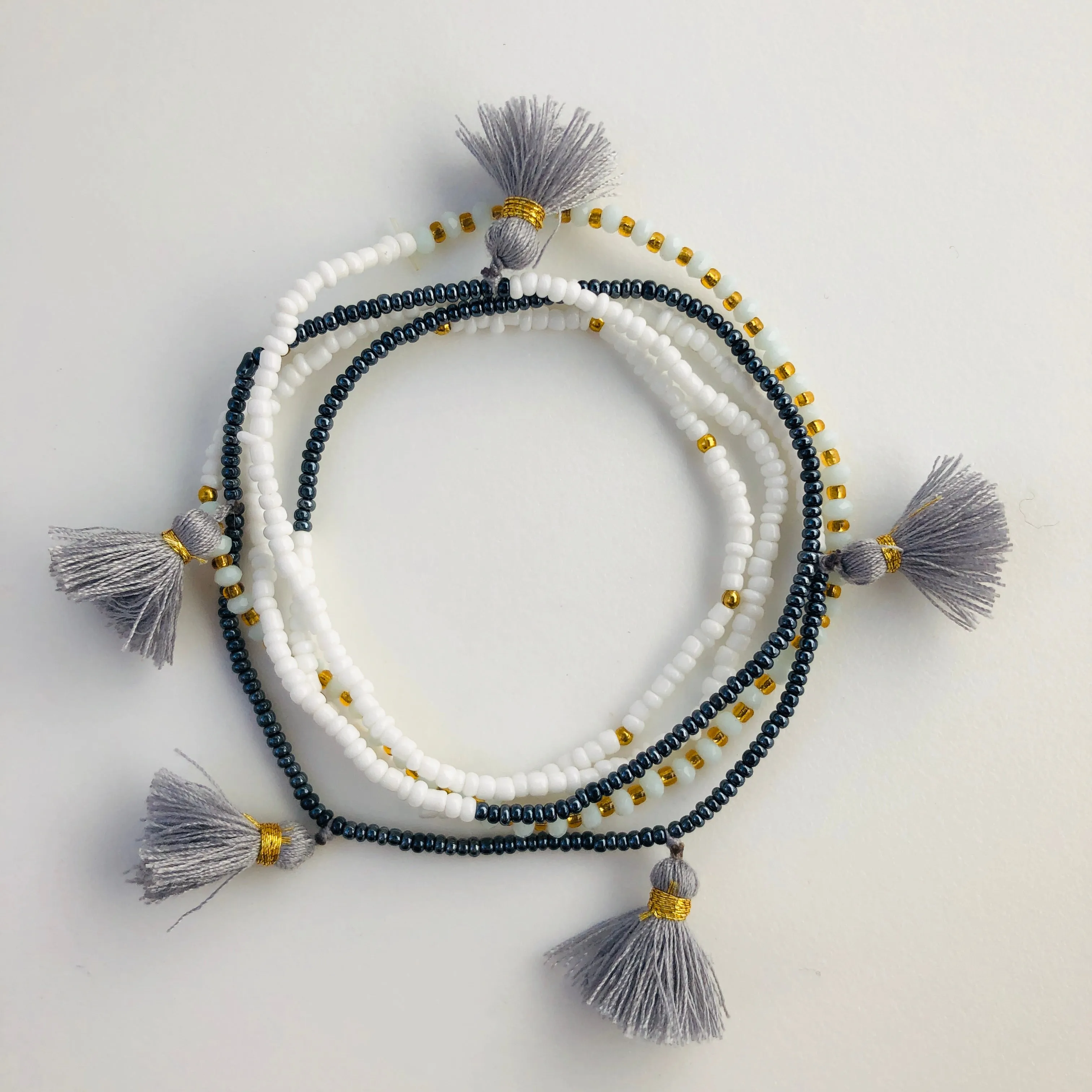 TM. 5 Bead Tassel Bracelet